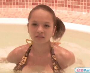 Teenage Paris Milan in a red-hot bathtub bathing suit just