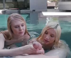 2 young lady women fellate in the pool